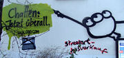 Ogo-Werbung mit Graffiti-Kommentar